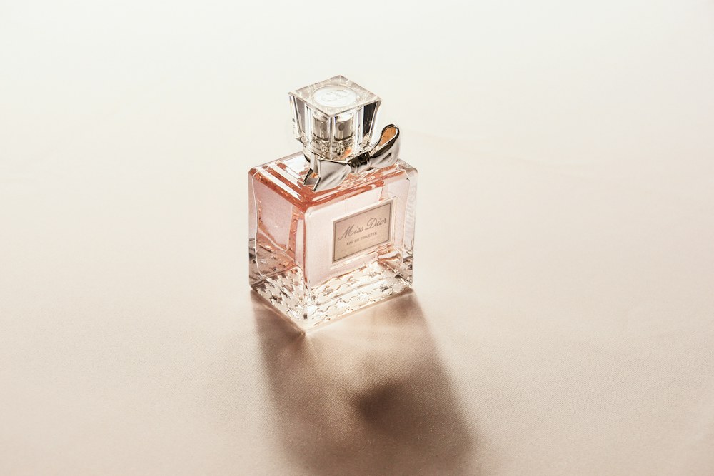 clear perfume bottle; illustrative stock photograph